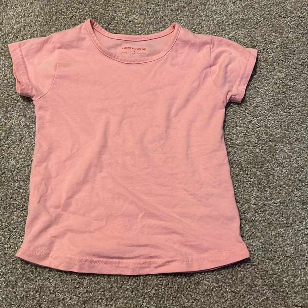 I am selling a pink small shirt for kids